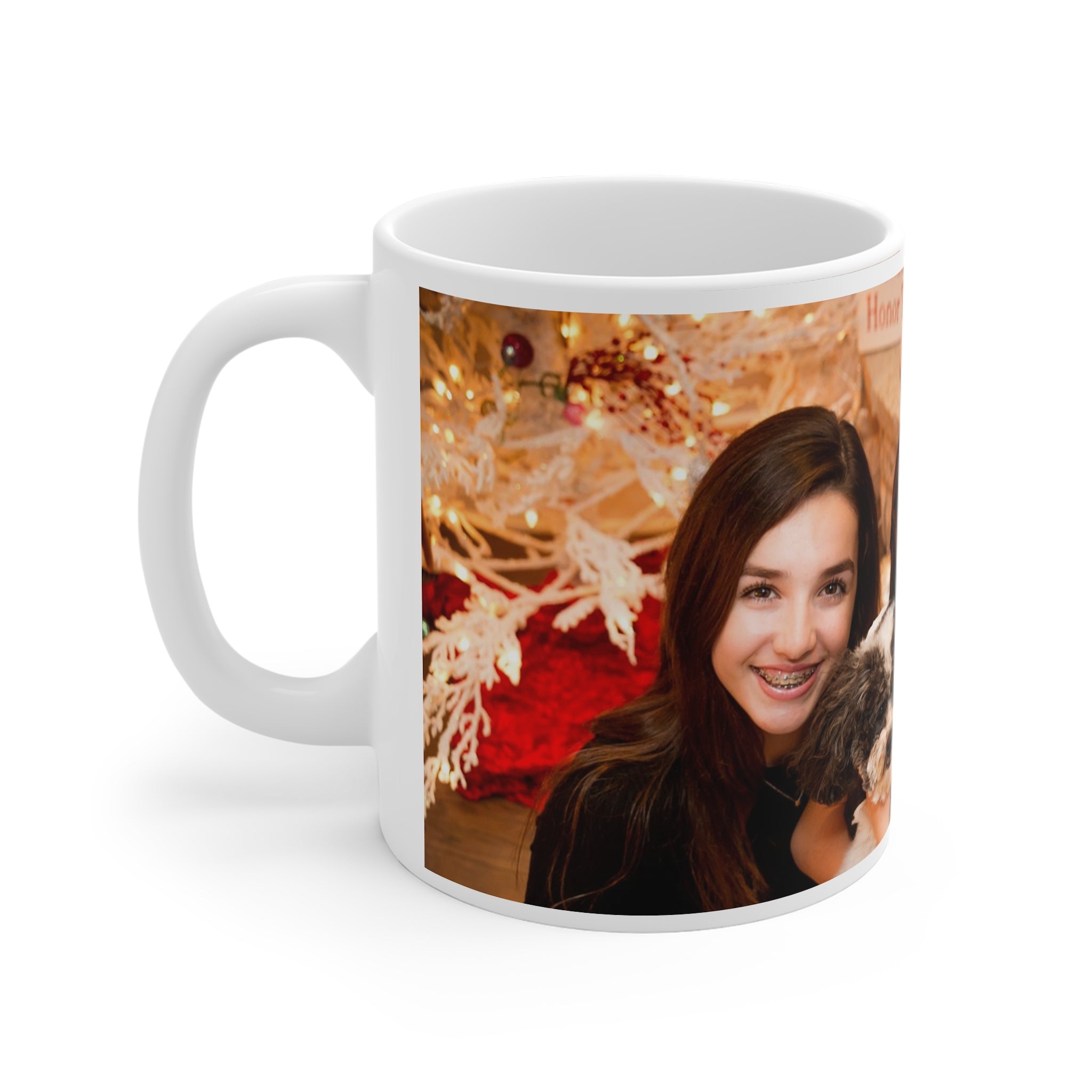 White mug with a printed design of a woman and festive lights on a white background